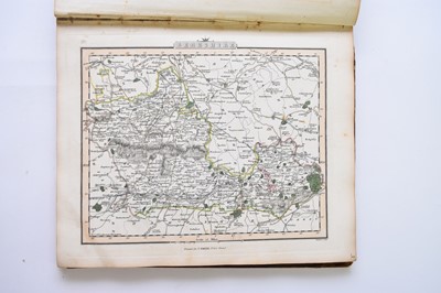 Lot 1163 - SMITH, Charles. Smith's New English Atlas containing a complete set of county maps. 4to 1828. With a map of England and Wales and 42 county maps. Outline hand colour. Half calf, boards detached.