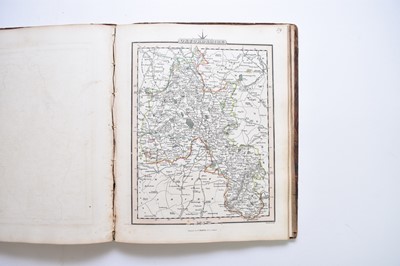 Lot 1163 - SMITH, Charles. Smith's New English Atlas containing a complete set of county maps. 4to 1828. With a map of England and Wales and 42 county maps. Outline hand colour. Half calf, boards detached.