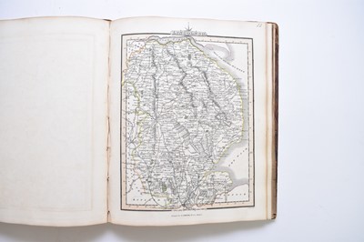 Lot 1163 - SMITH, Charles. Smith's New English Atlas containing a complete set of county maps. 4to 1828. With a map of England and Wales and 42 county maps. Outline hand colour. Half calf, boards detached.