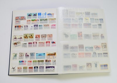 Lot 255 - World mix of stamps in blue SG stockbook