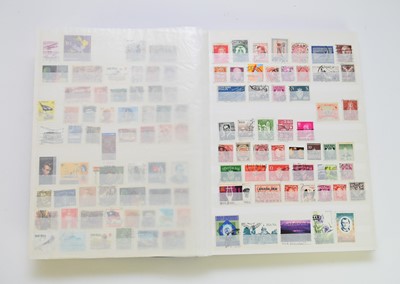 Lot 255 - World mix of stamps in blue SG stockbook