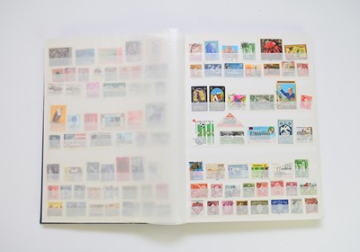 Lot 255 - World mix of stamps in blue SG stockbook