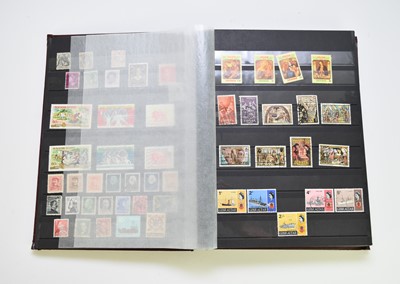 Lot 256 - World mix of stamps in burgundy stock book