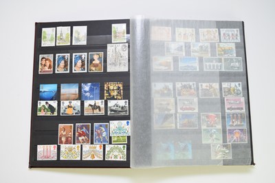 Lot 258 - Burgundy album containing mint and used GB plus some Commonwealth stamps