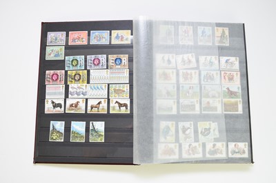 Lot 258 - Burgundy album containing mint and used GB plus some Commonwealth stamps