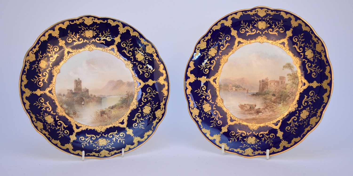 Lot 54 - A pair of Coalport plates by J.H Plant, late 19th/early 20th century
