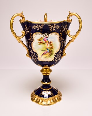 Lot 197 - A Coalport trophy vase painted with birds, fruit, flowers and insects, early 20th century