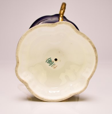 Lot 197 - A Coalport trophy vase painted with birds, fruit, flowers and insects, early 20th century