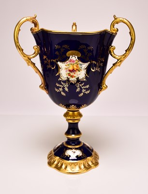 Lot 197 - A Coalport trophy vase painted with birds, fruit, flowers and insects, early 20th century