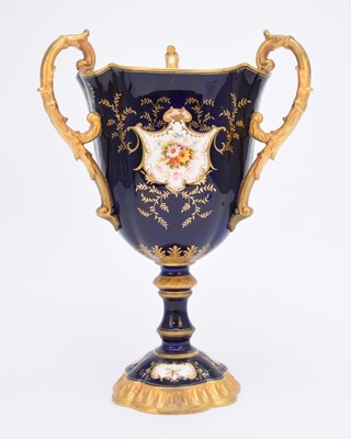 Lot 63 - Large Coalport trophy cup with three handles, late 19th/early 20th century