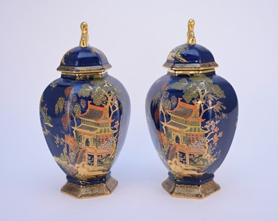 Lot 151 - A pair of Carlton Ware Art Deco lustre vases and covers