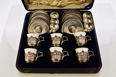 Lot 215 - Unusual Coalport silver-mounted coffee set with saucers and spoon or cigar holders