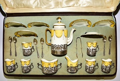 Lot 224 - Coalport cased silver-mounted coffee service, Chester 1907