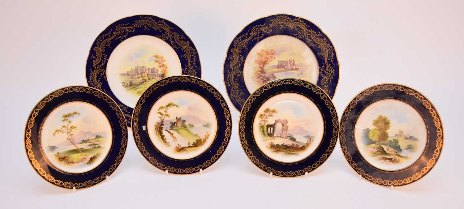 Lot 85 - A set of eight Coalport painted landscape side plates and two further plates