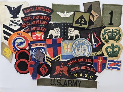 Lot 152 - Thirty-three assorted military cloth badges,...