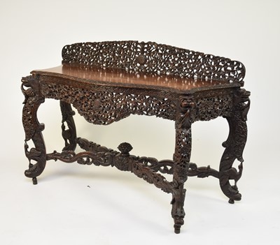 Lot 127 - A 19th century Burmese carved rosewood side table, 19th century