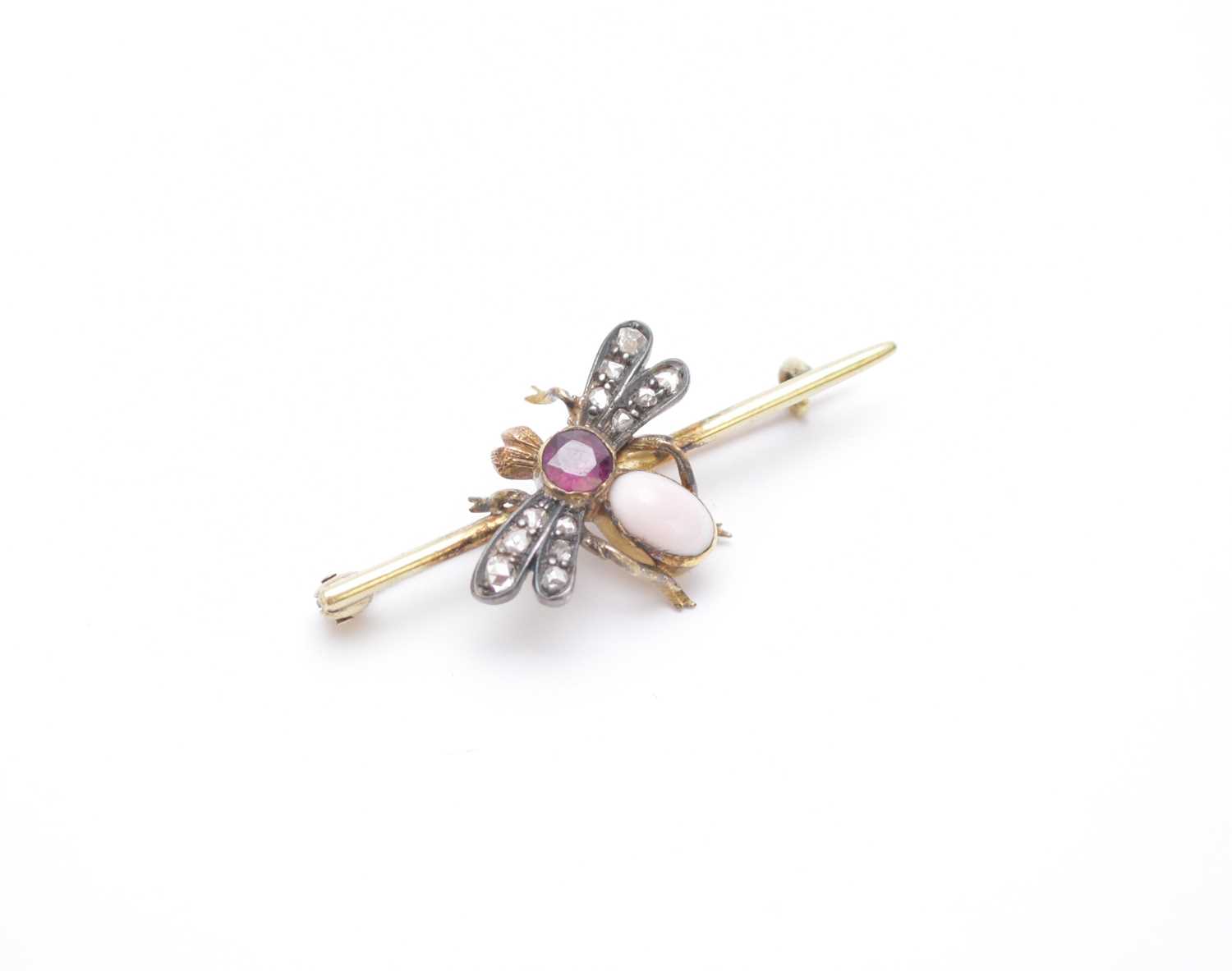 Lot 127 - A rose cut diamond, garnet and untested coral insect bar brooch