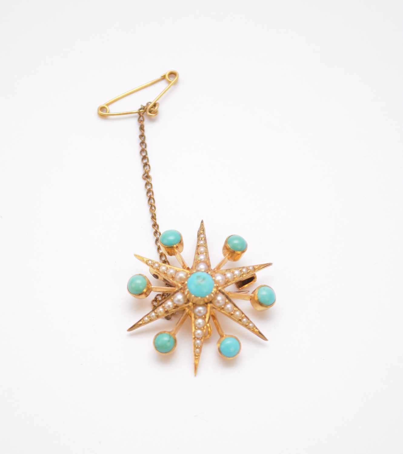 Lot 288 - A late 19th / early 20th century turquoise and split seed pearl set star burst brooch/pendant