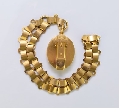 Lot 31 - A Victorian yellow metal oval locket on chain