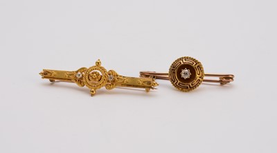 Lot 307 - Two diamond set bar brooches