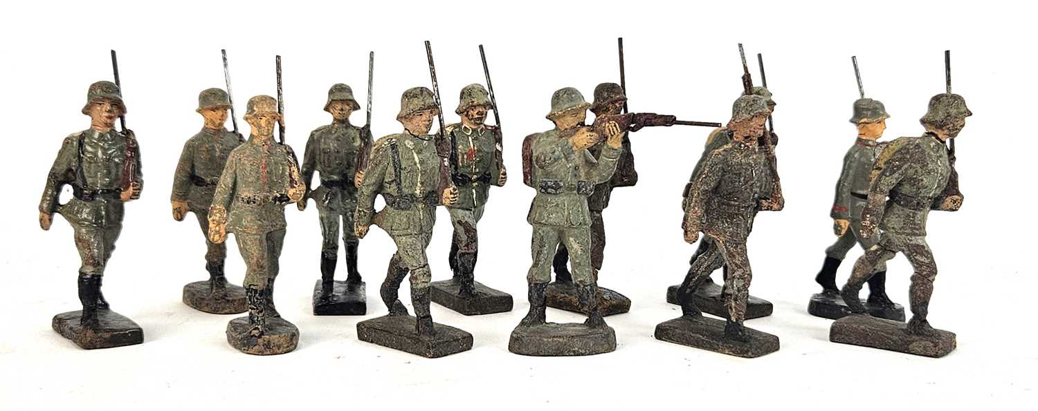 Lot 227 - Twelve German painted composition toy models...