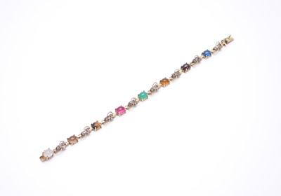 Lot 142 - A multi-coloured paste cabochon set bracelet