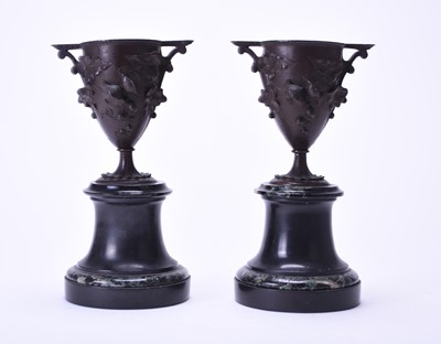 Lot 550 - A pair of French bronze and marble vases