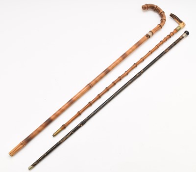 Lot 152 - Three swordsticks including one with a 13th Hussars badge