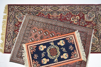 Lot 143 - A Tabriz rug and two other smaller rugs