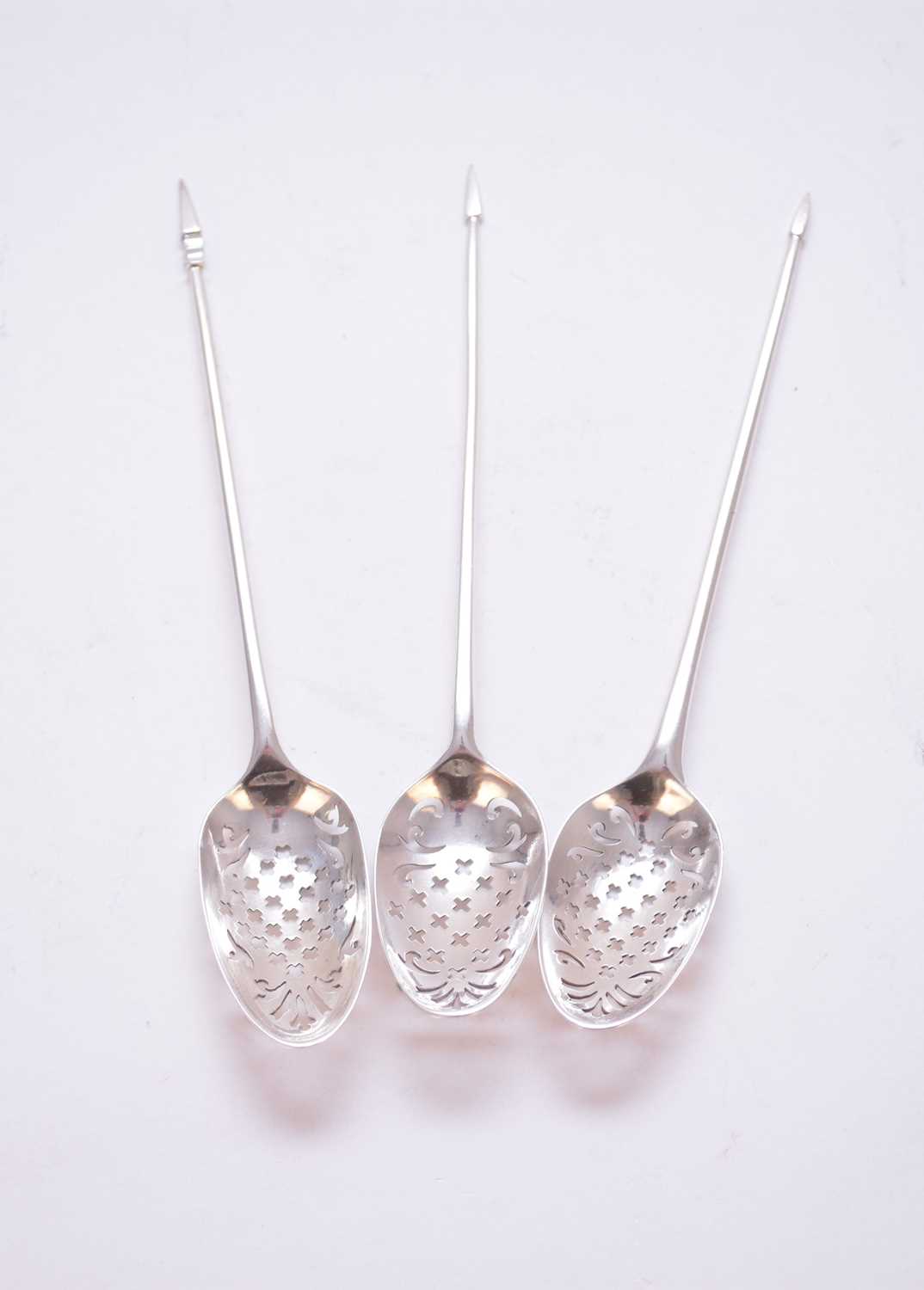 Lot 46 - Three 18th century silver mote spoons