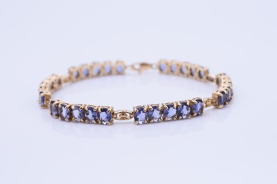 Lot 217 - A tanzanite line bracelet