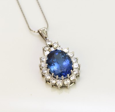 Lot 41 - A tanzanite and diamond pendant on chain