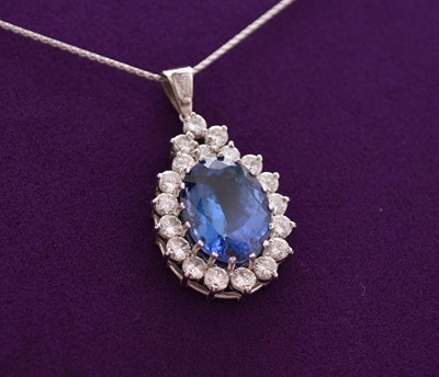 Lot 41 - A tanzanite and diamond pendant on chain