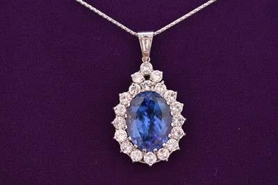 Lot 41 - A tanzanite and diamond pendant on chain