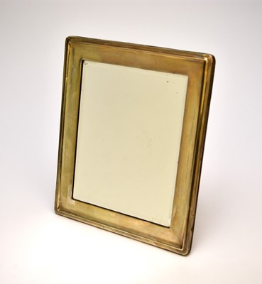 Lot 74 - A silver mounted mirror