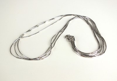 Lot 242 - A 9ct white gold three strand necklace