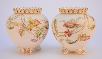 Lot 107 - A pair of unusual Coalport blush ivory vases, late 19th century