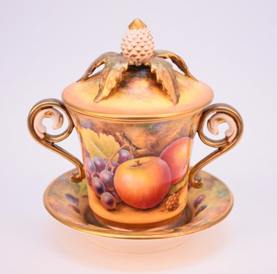 Lot 258 - A Royal Worcester fruit-painted cup, cover and stand