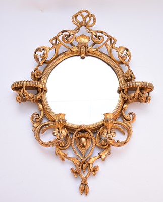 Lot 663 - A rococo revival giltwood girandole wall mirror