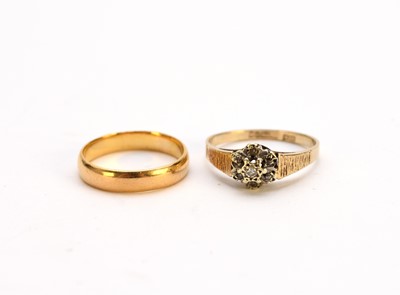 Lot 267 - A 22ct gold wedding band and a 9ct gold diamond ring