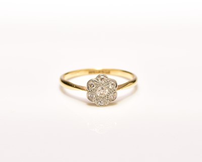 Lot 202 - An early 20th century floral diamond cluster ring