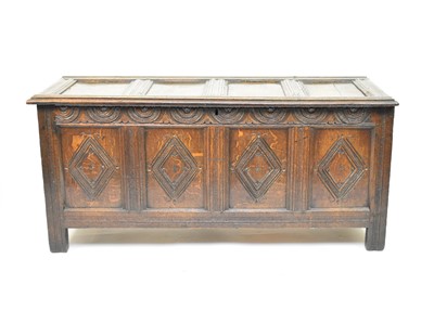 Lot 202 - A 17th century oak four-panel coffer