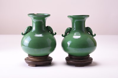 Lot 14 - A pair of Chinese green-glazed Langyao vases, Qing Dynasty