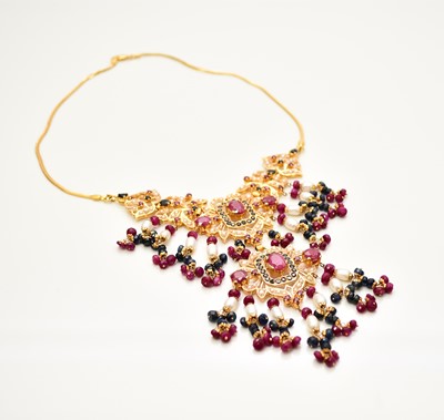 Lot 158 - A Middle Eastern untested ruby, sapphire, freshwater pearl and onyx fringe necklace