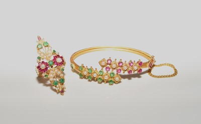 Lot 191 - A stone set bangle and a stone set ring