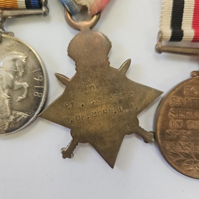 Lot 113 - WW1 Medal trio and a Special Constabulary Long Service Medal