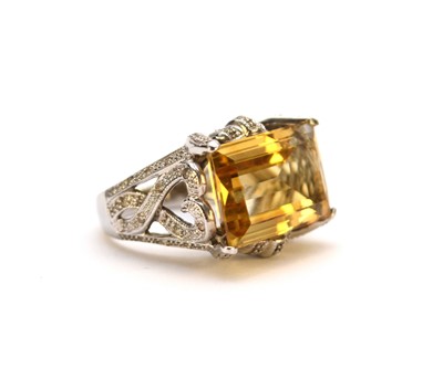 Lot 264 - A large citrine and diamond dress ring