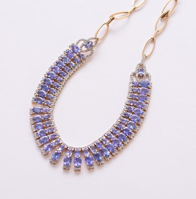 Lot 223 - A tanzanite and diamond graduated fringe necklace