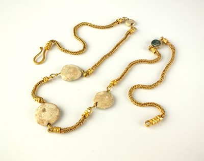 Lot 321 - A yellow metal stone set chain