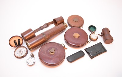 Lot 439 - An assembled group of tape measures, a telescope and other instruments